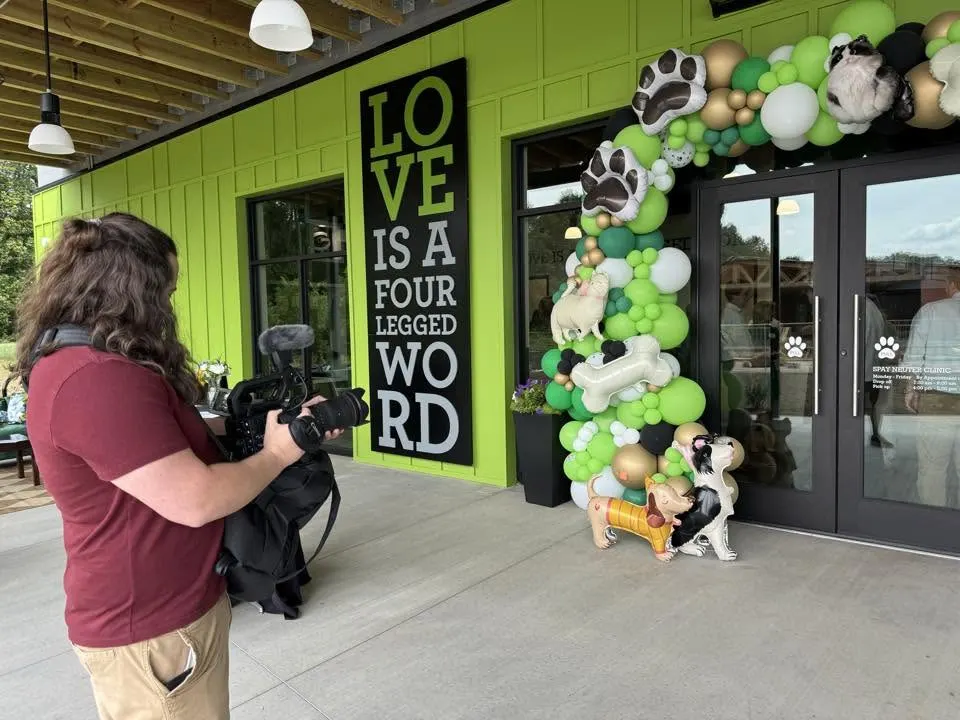 Shooting event coverage outside a pet store entrance